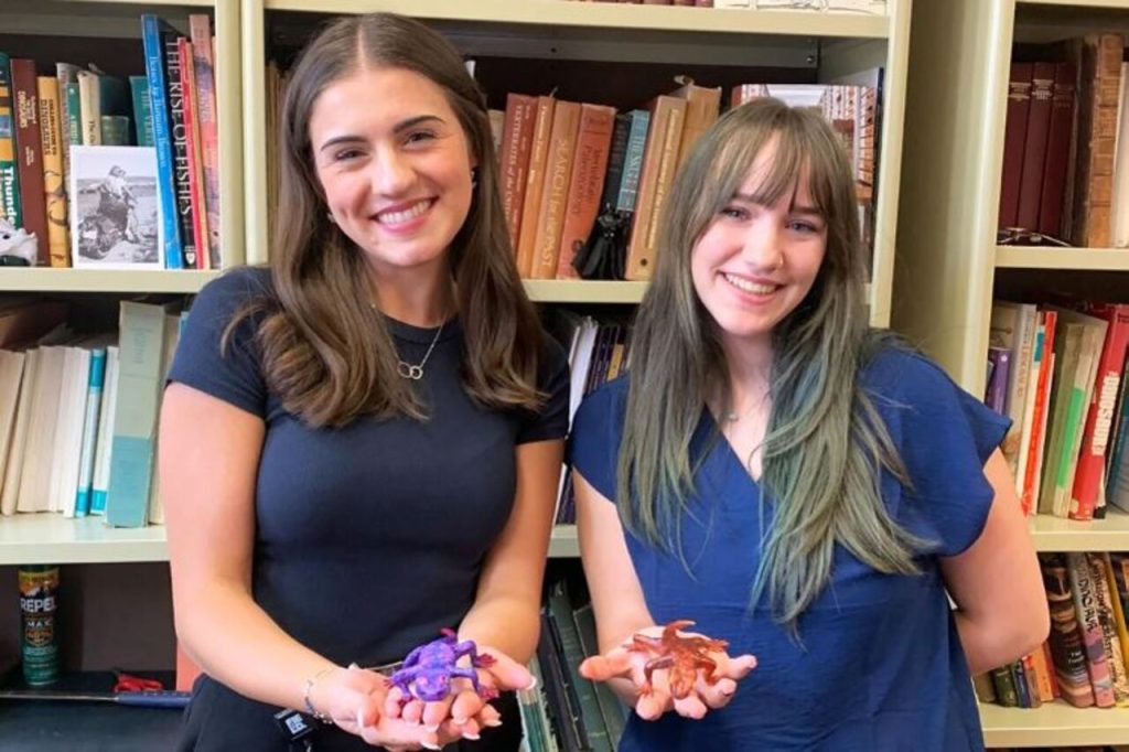 Two Student Scientists