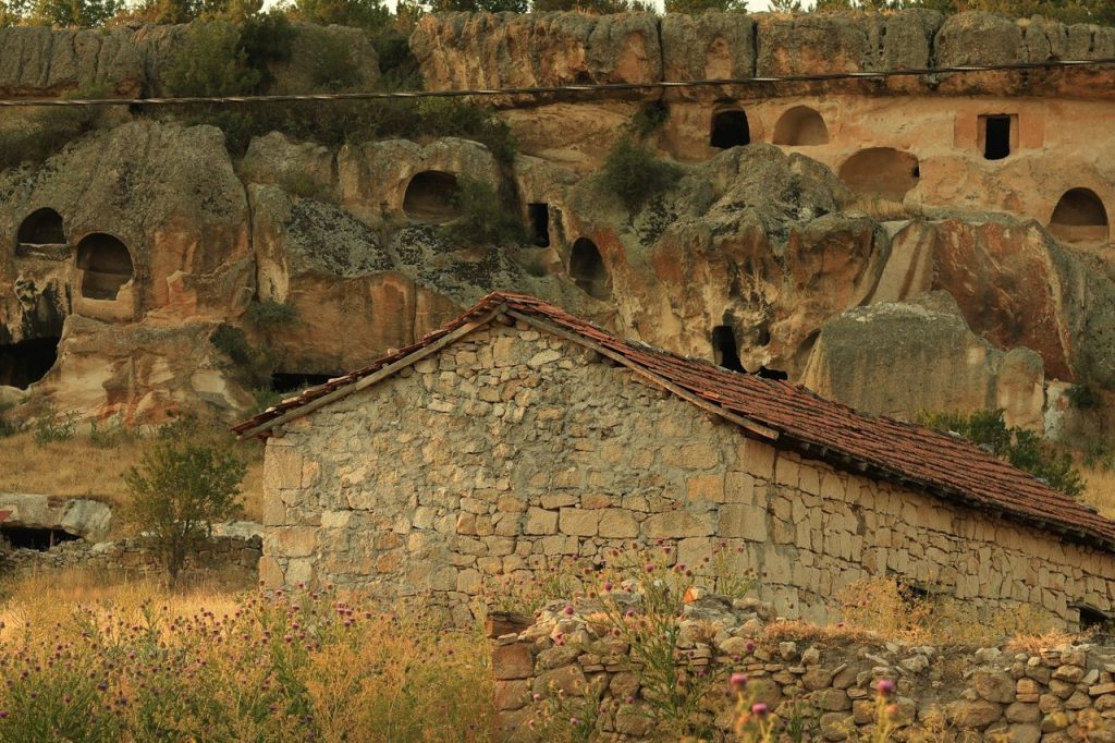 Postholes and a Hearth Point to an Early Shelter