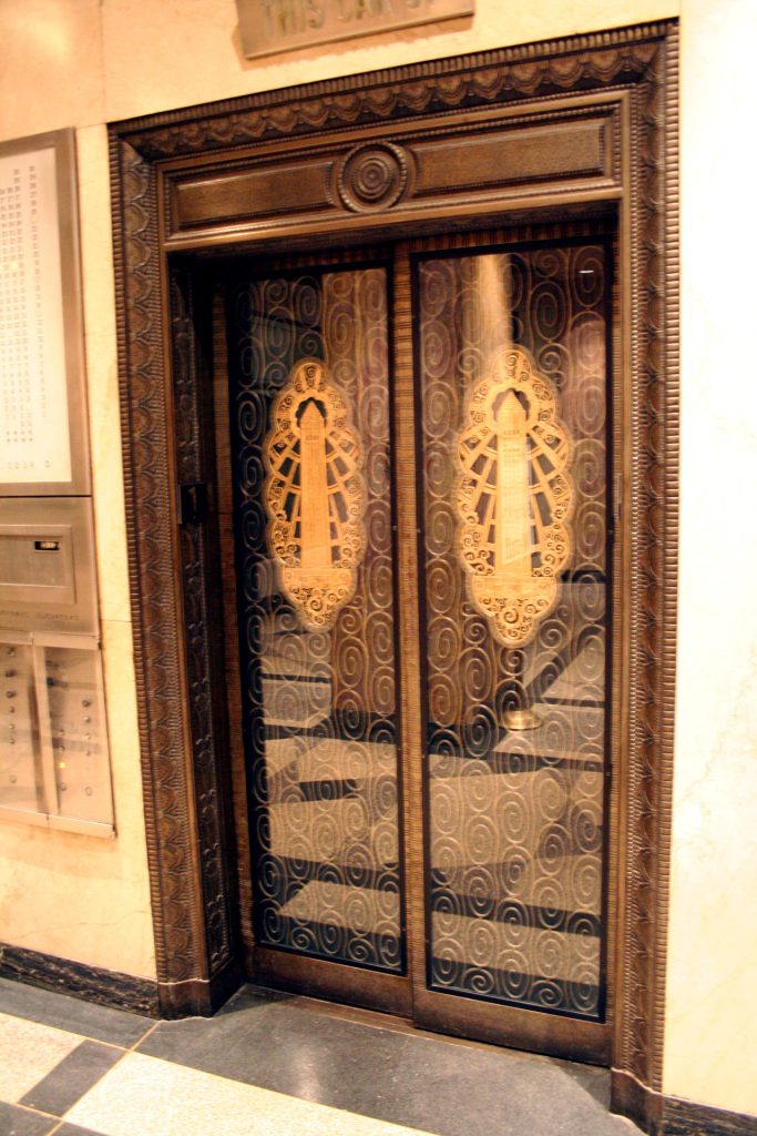 Carved Chevrons and Elaborate Doorways Showcase Its Art Deco Style