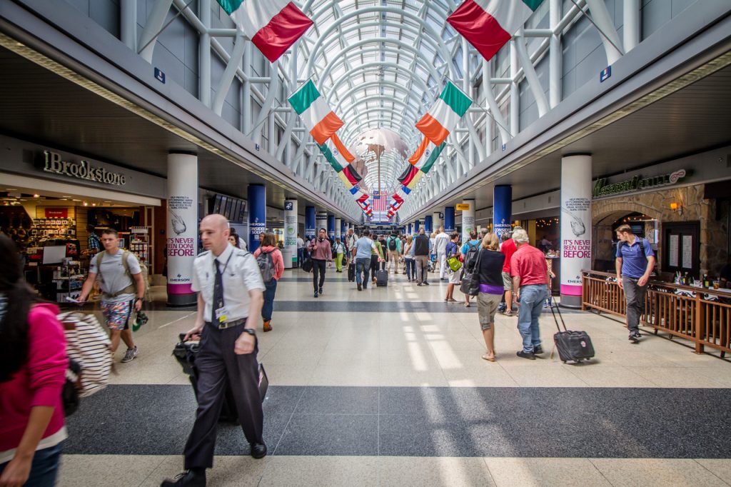 Chicago O’Hare International Airport Features Glowing Tunnels and a Giant Dinosaur