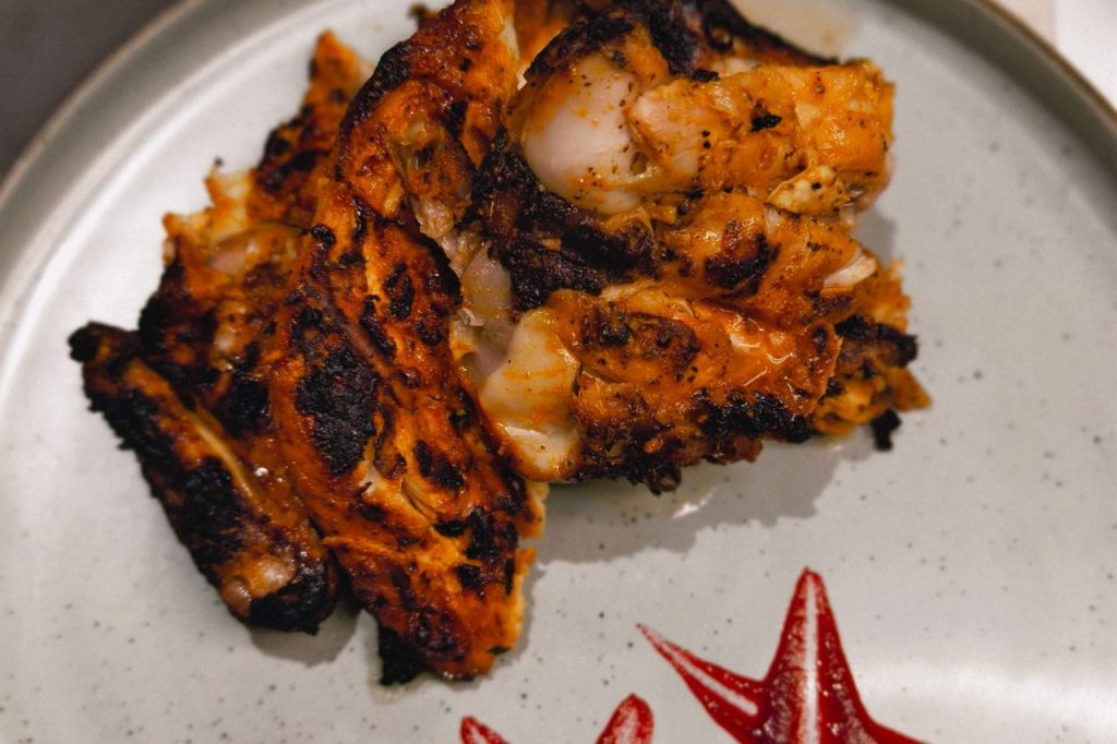 Flame-Grilled Chicken and Five Signature Flavors Define the Menu
